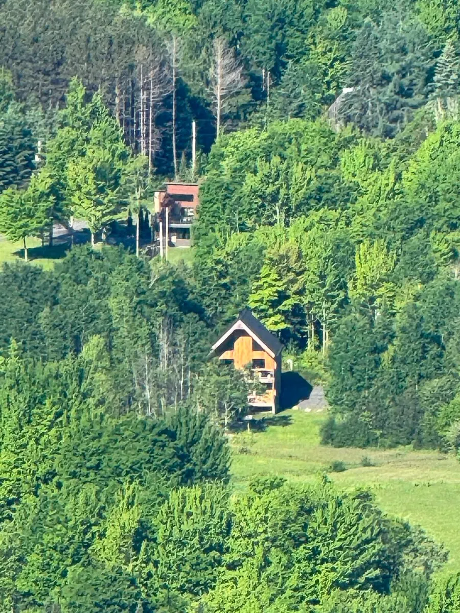 Aerial view of Villa Foresta tucked into the forest