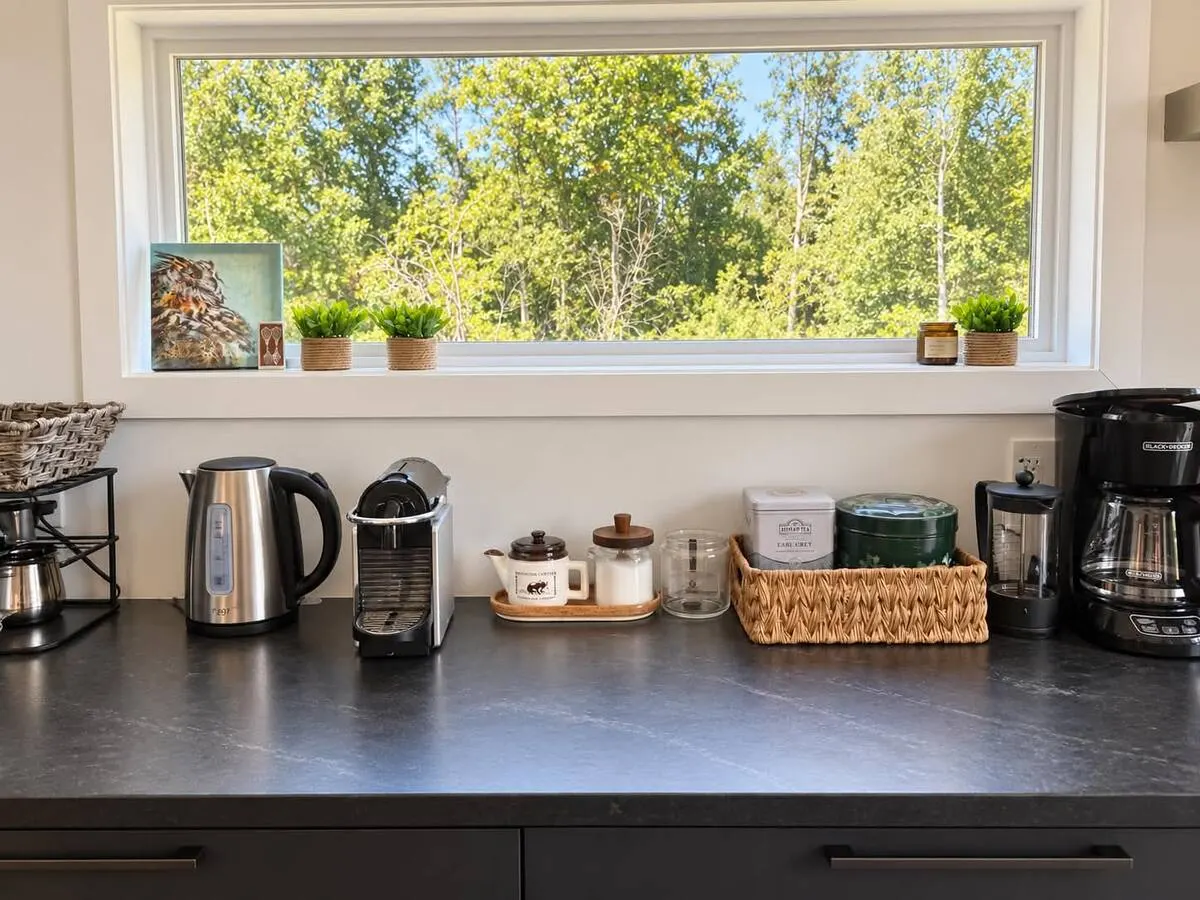 Coffee and tea station set up under a window at Villa Foresta