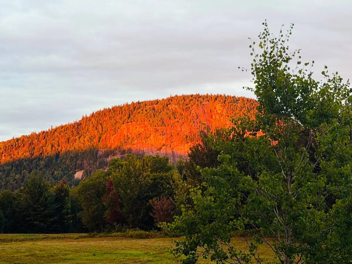 Mount Pinacle glowing orange at sunset
